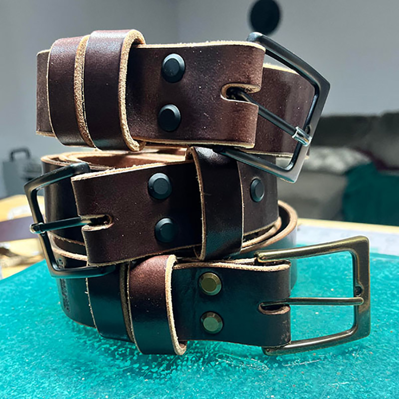 three stacked belts